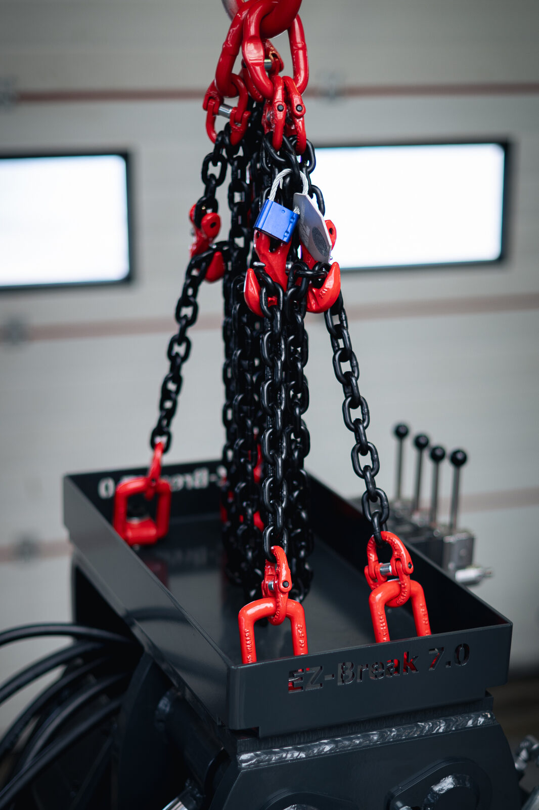 EZ Break 7.0 suspended on lifting chains for handling.